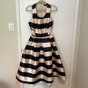 Miss Avenue black and ivory striped a line dress with cut out detail